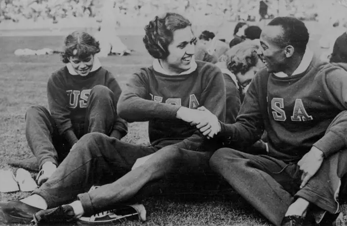 Miss Helen Stephens & Jesse Owens congratulating each other at the Olympic Games. August 31, 1936. (Photo by Associated Press Photos).