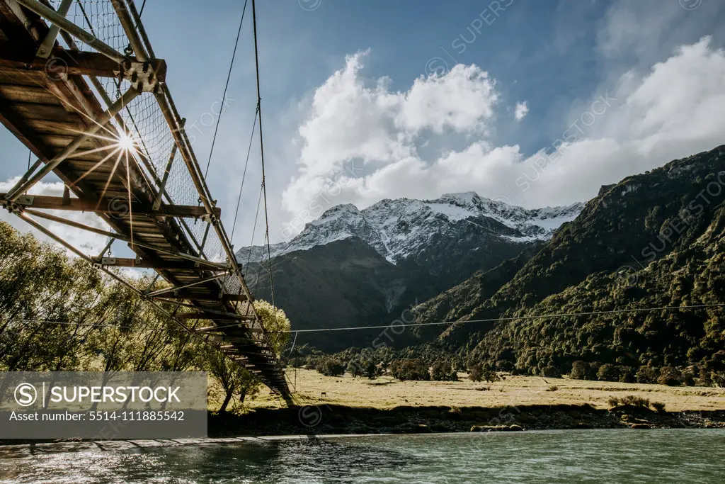 A Pedestrian suspension bridge over the Matukituki River, New Zealand