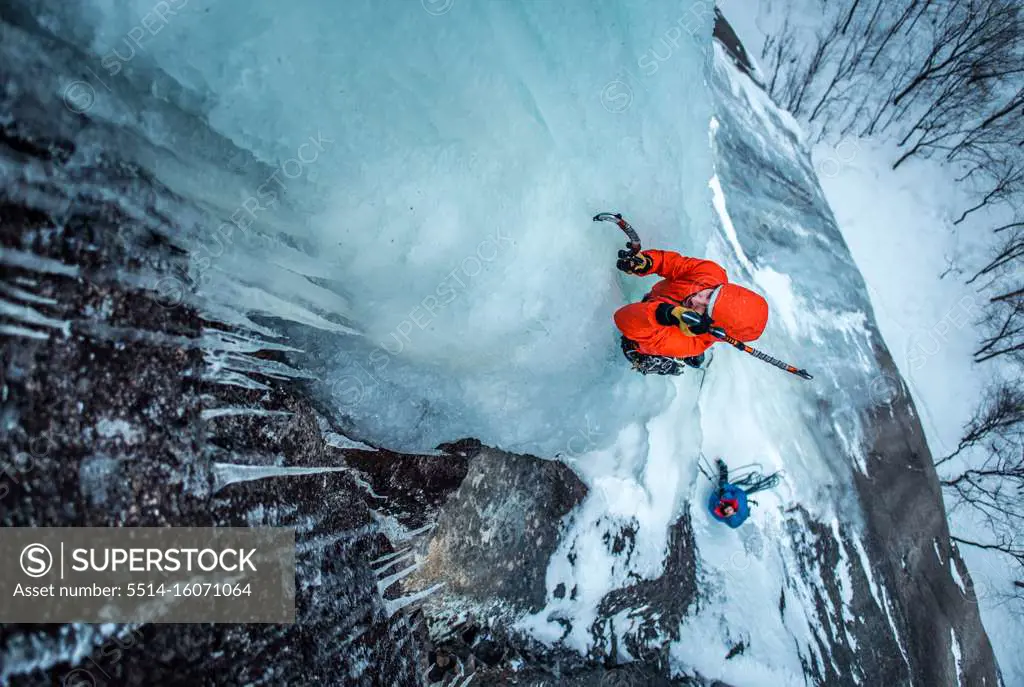 Man ice climbing on Cathedral Ledge in North Conway, New Hampshire