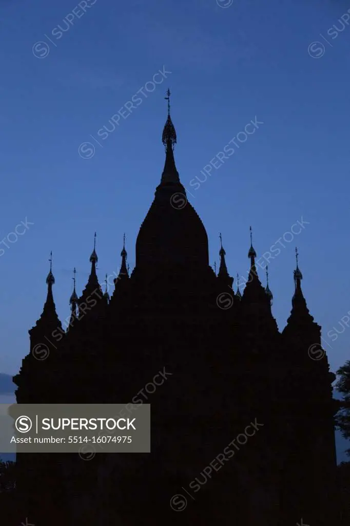 Silhouette of an old temple in Bagan with night sky as background