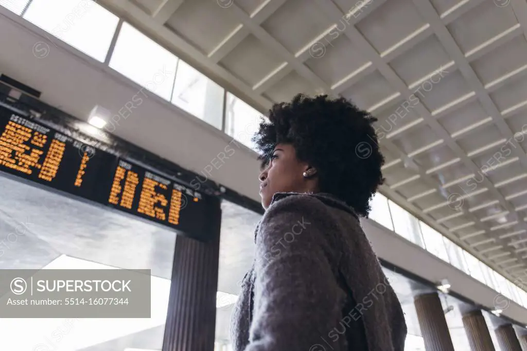 Portrait of a business woman at train station