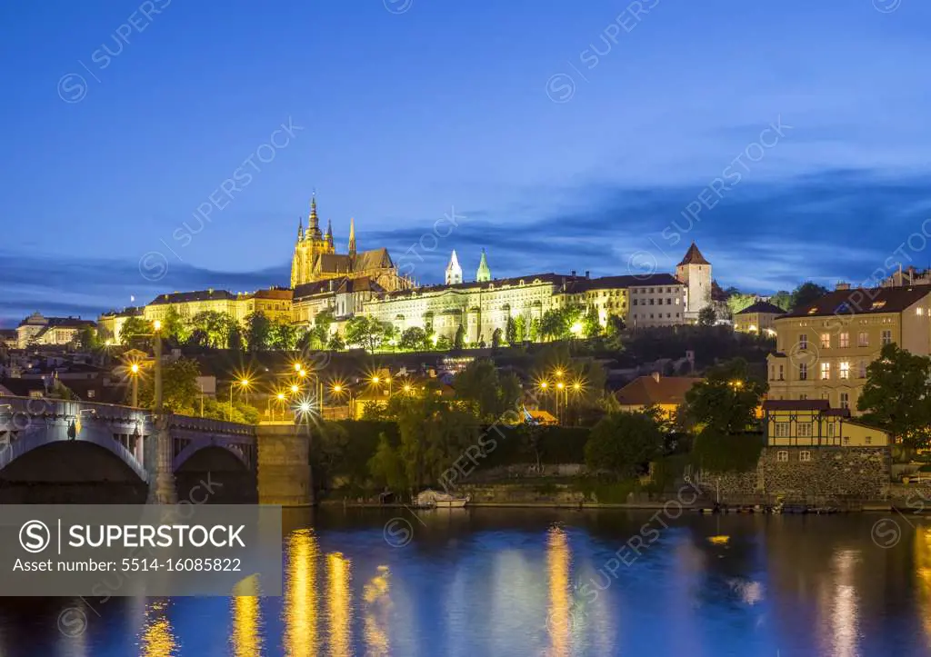 Prague Castle, Prazsky Hrad, on the Vltava River at dusk, Prague, Czech Republic