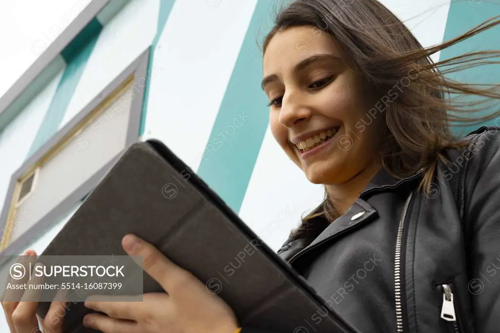 Woman watching a video on a tablet.