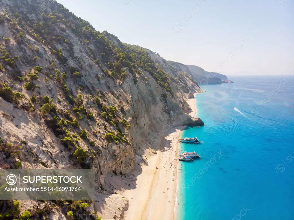 Tourist ship on the Egremni beach, Lefkada, Greece.