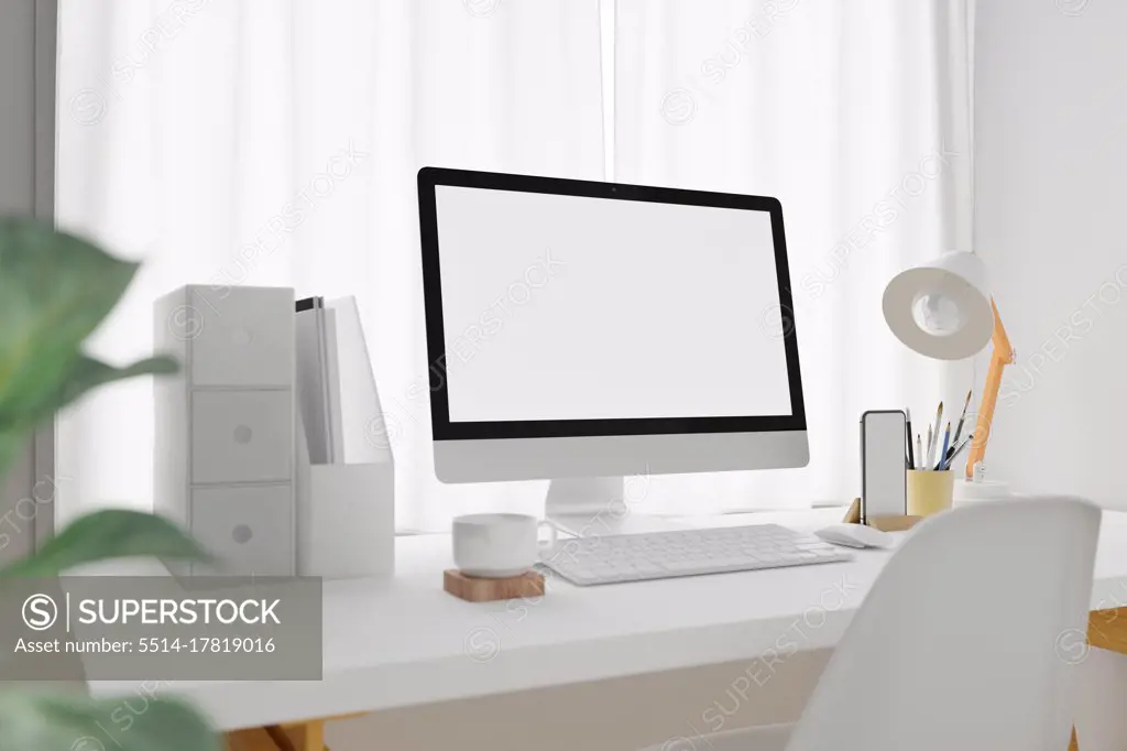 Workspace with mockup blank screen laptop computer.