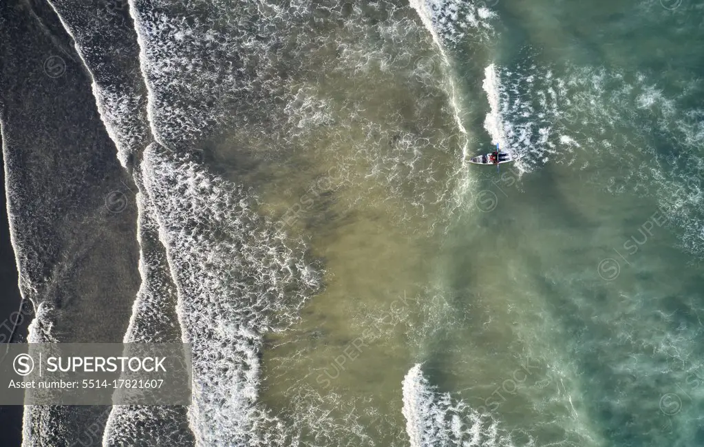 Majestic waves and kayak from drone