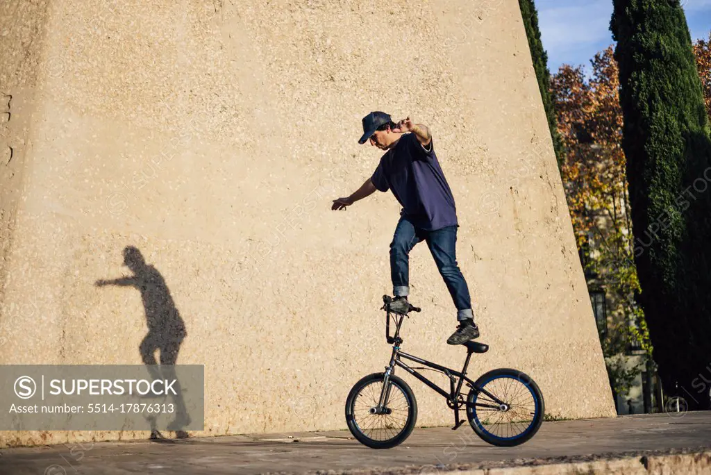 Man practicing tricks with the bmx bike in the city