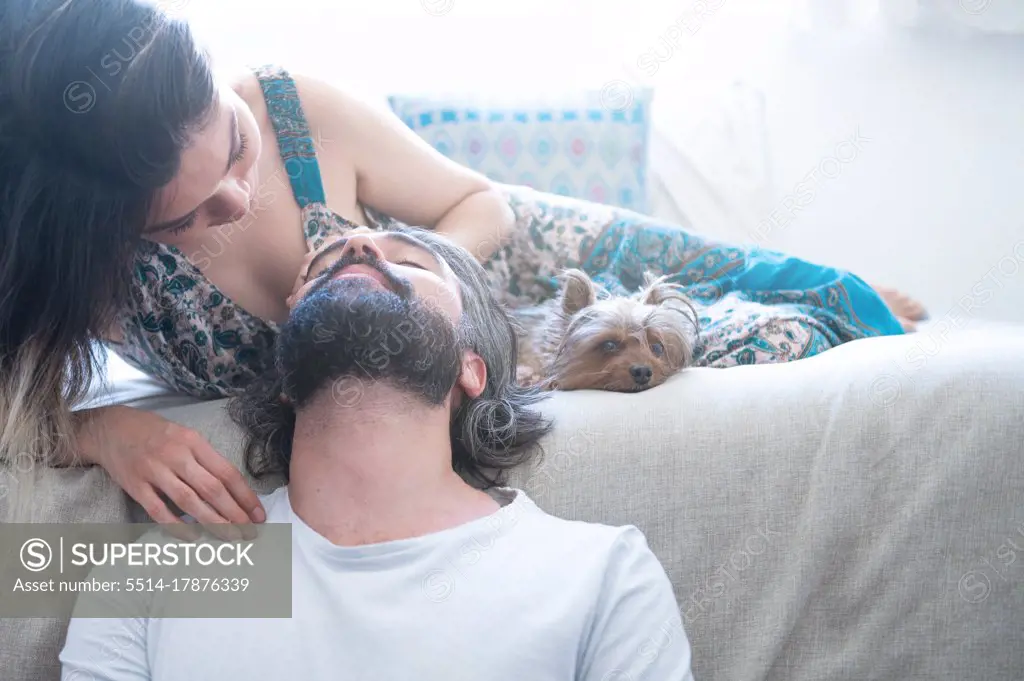 Couple in love laughing in their room. Valentine's day