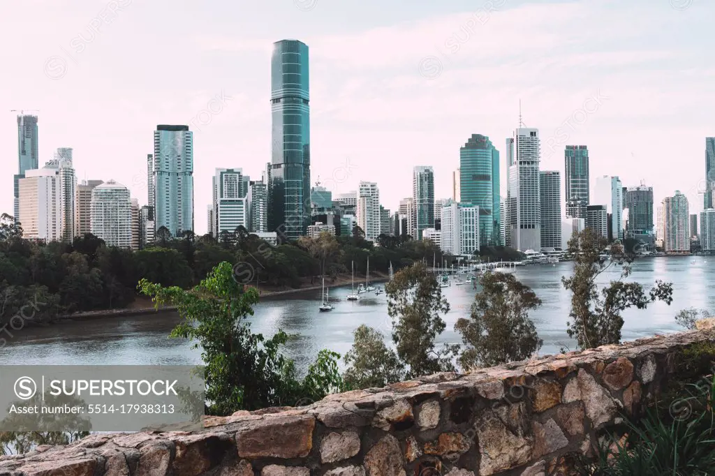 modern building with river in brisbane