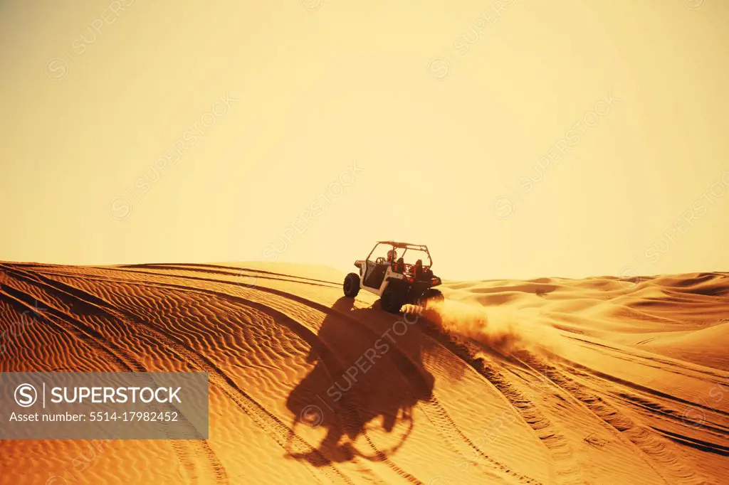 Buggy quad bike with smoke rides in Dubai desert dunes safari