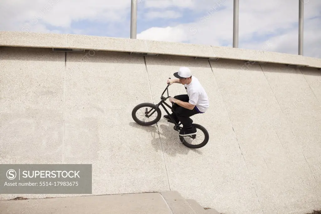 Young bmx rider trying to land trick