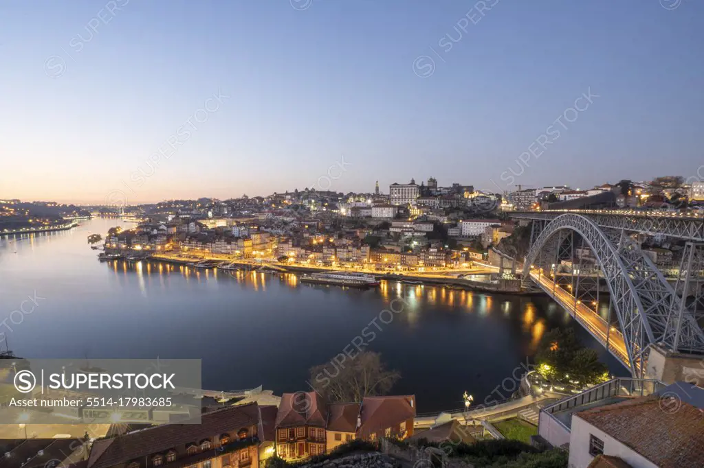 WS panorama of Oporto city, iconic bridge and Douro river at night