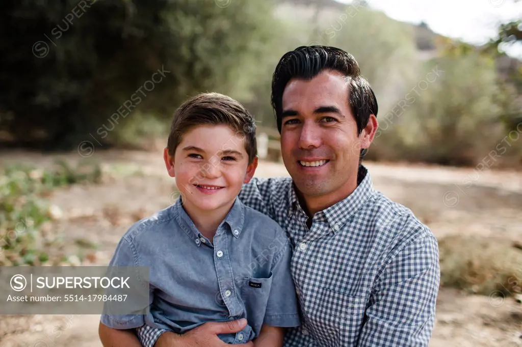 Dad & Son Smiling for Camera in San Diego