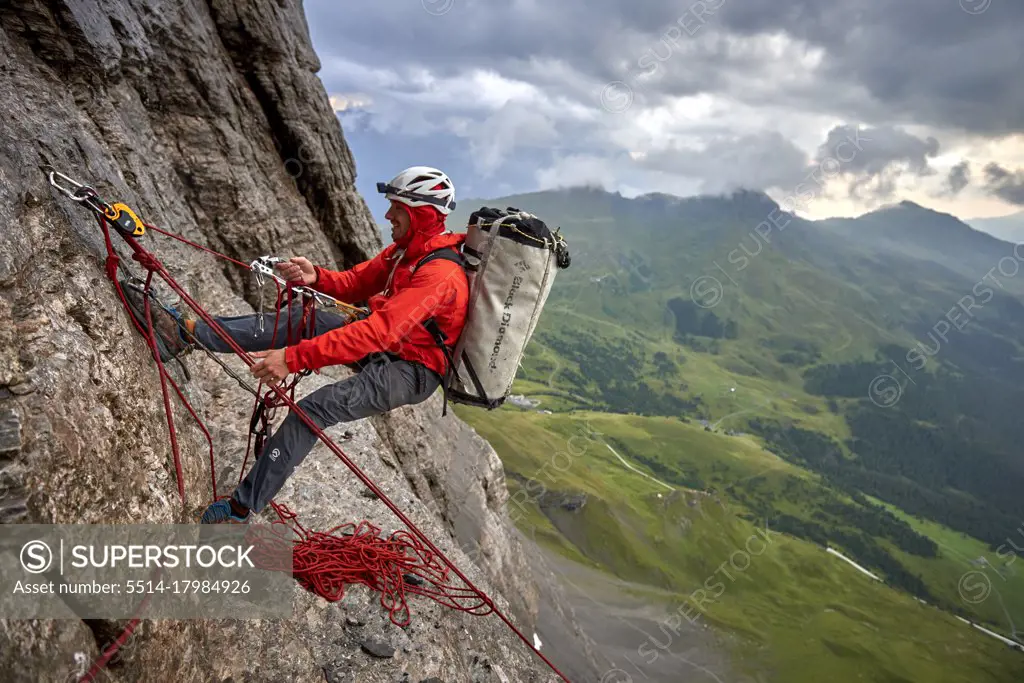 Jacopo Larcher hauling bags climbing the Eiger North Face, Switzerland