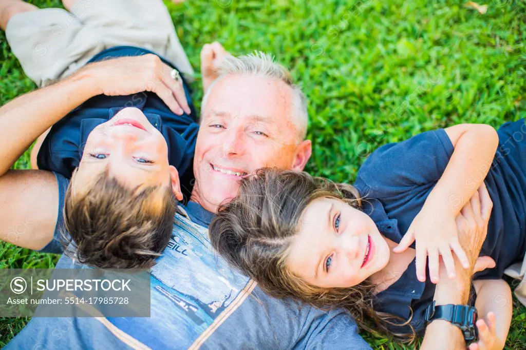 TWINS GOOFING AROUND WITH DAD