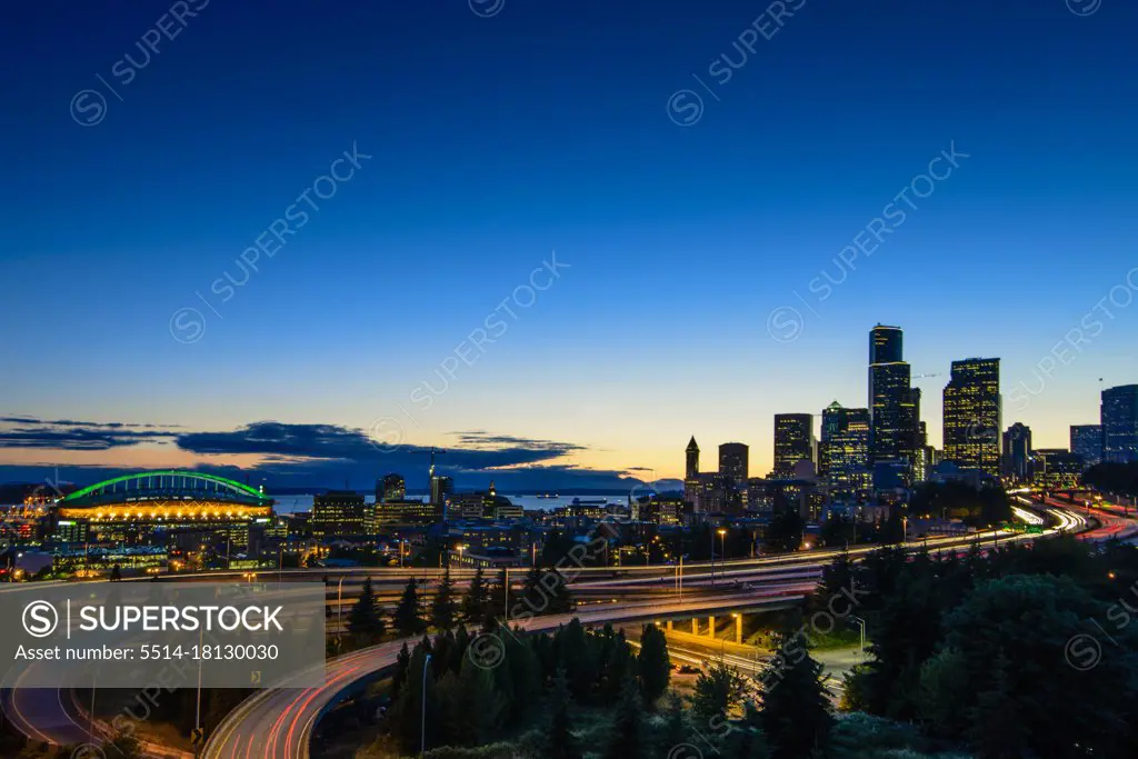 View of Seattle Skyline at Night Overlooking I-5 and Lumen Field