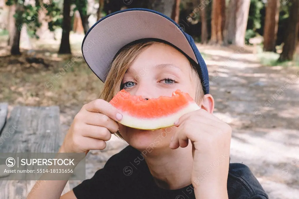 Boy Turns Watermelon Rind into a Smile.