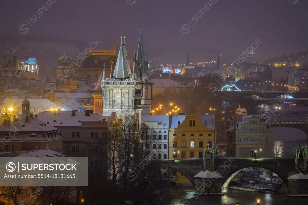 Old Town Bridge Tower, National Theatre and Charles bridge at night in winter, Prague, Czech Republic