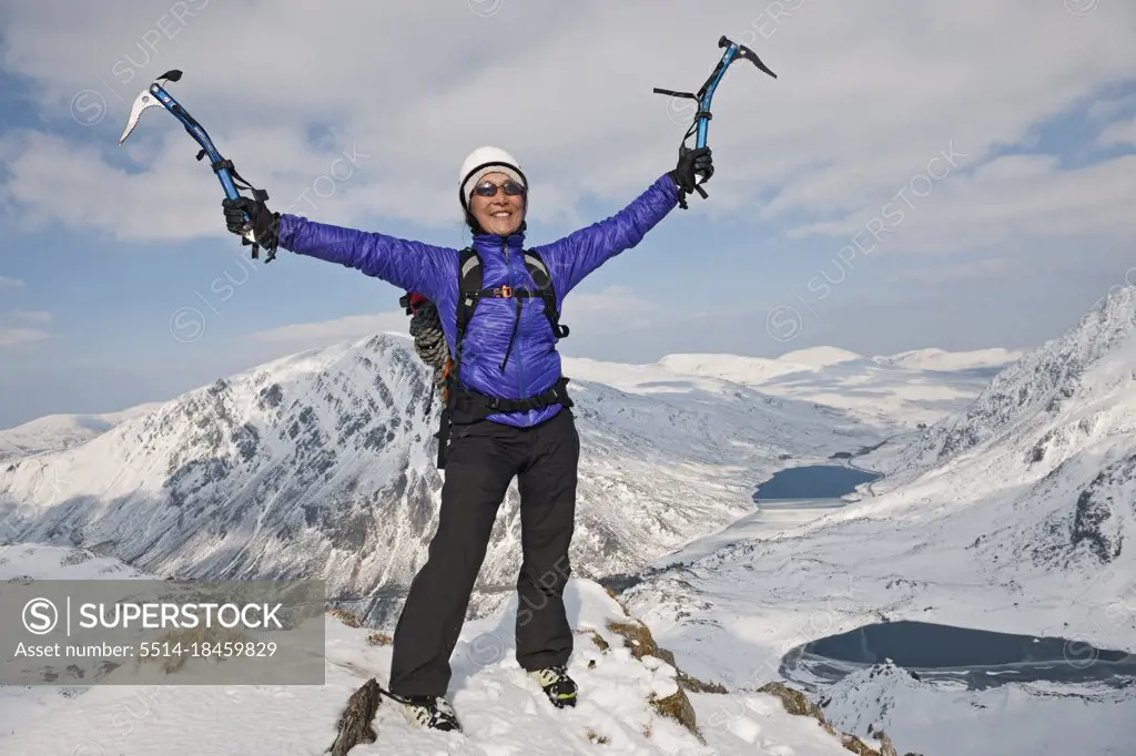 Woman on the top of Mount Tryfan in north Wales