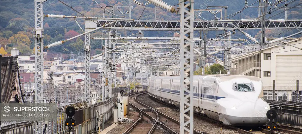 Japanese high speed train Shinkansen entering the station