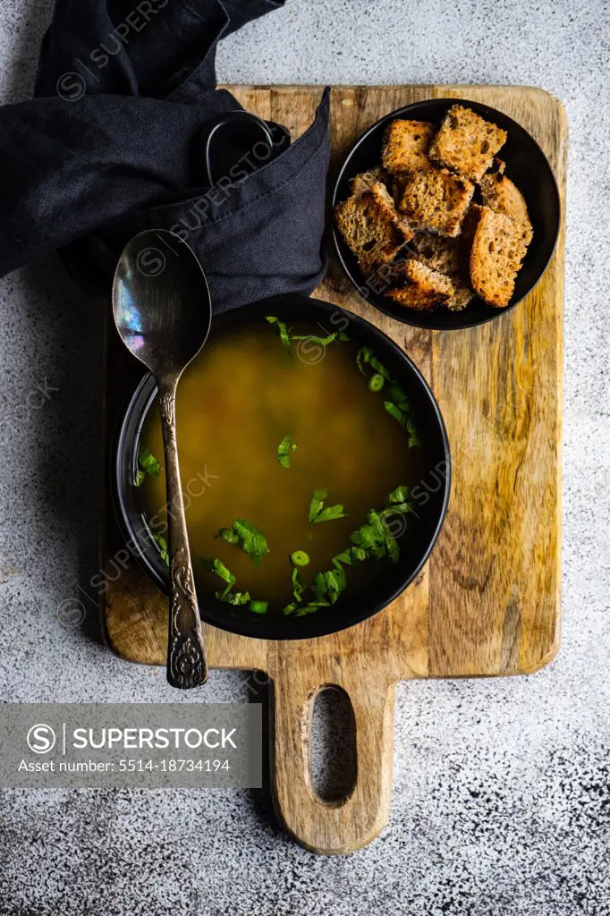 Chicken broth served in a bowl