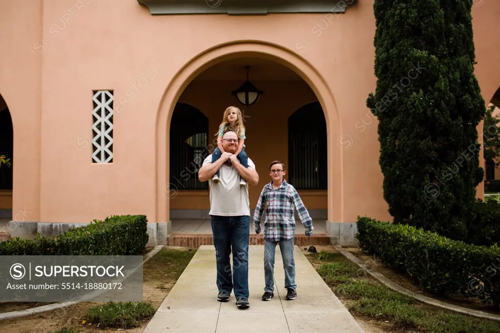 Dad Walking with Kids at Liberty Station in San Diego