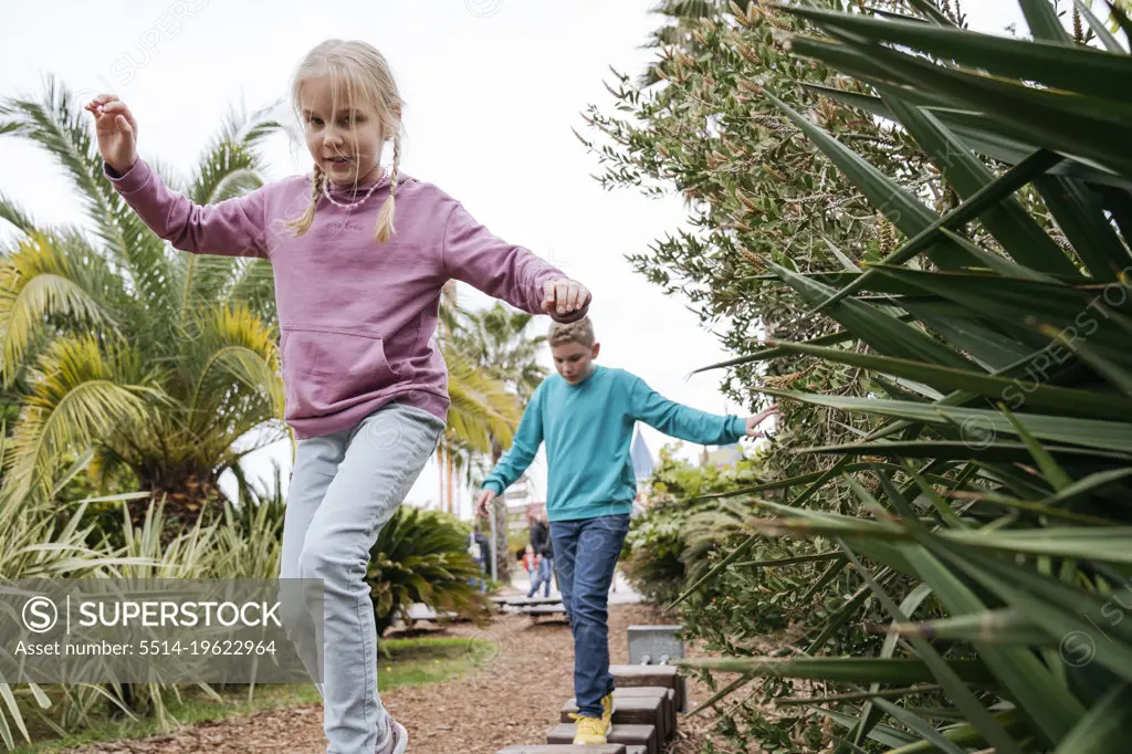 Children in the park on the sports playground.