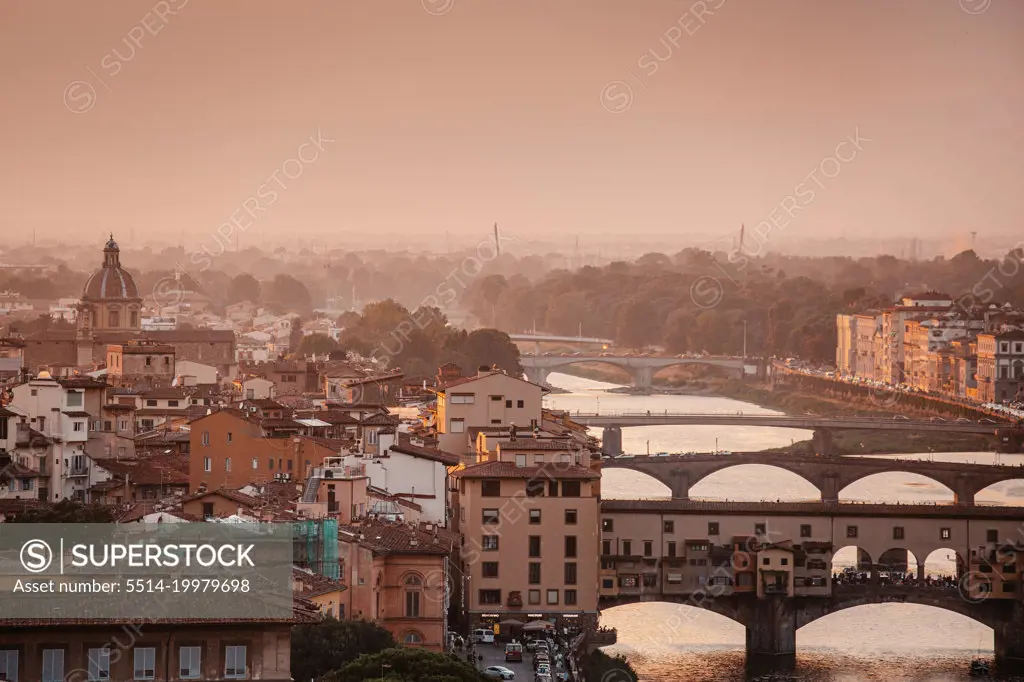 Ponte Vecchio in Florence, Italy, in summer sunset.