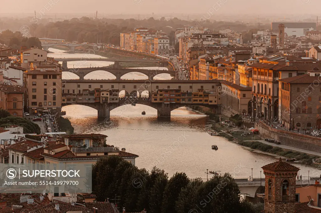 Ponte Vecchio in Florence, Italy, in summer sunset.