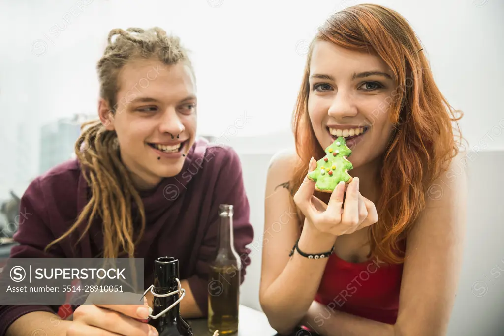 Young couple celebrating Christmas, Munich, Bavaria, Germany