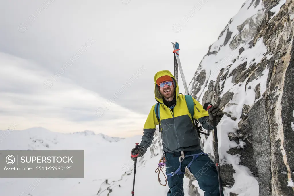 Portrait of happy ski mountaineer, enjoying a day in the mountains