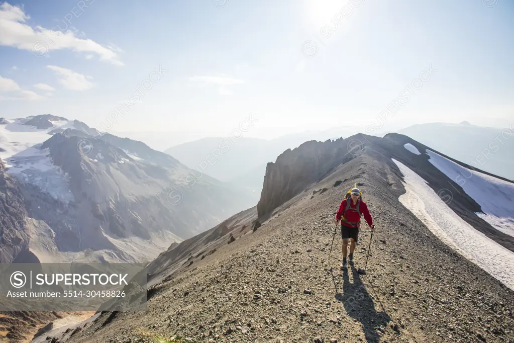 Hiker crosser talus slope in B.C. Canada.