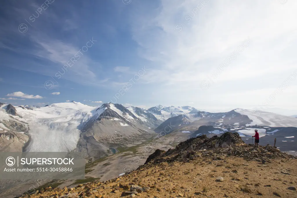 Hiker on the summit of Ochre Mountain,