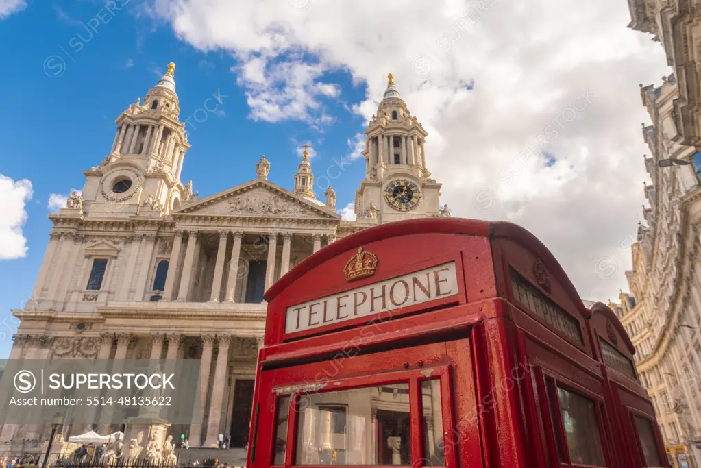 St Paul's Cathedral with iconic telephone cell and london taxi