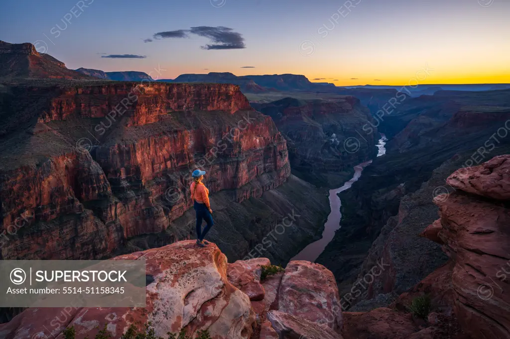 Woman Looking out over the Grand Canyon from Toroweap