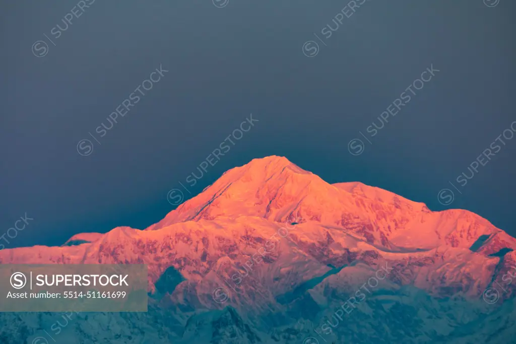 Alpenglow lights up Denali at sunrise