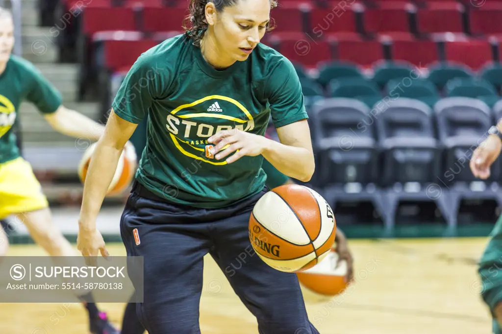 Female basketball player warming up before game, Seattle, Washington, USA