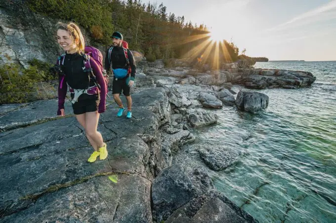 Couple Backpacking Along Georgian Bay