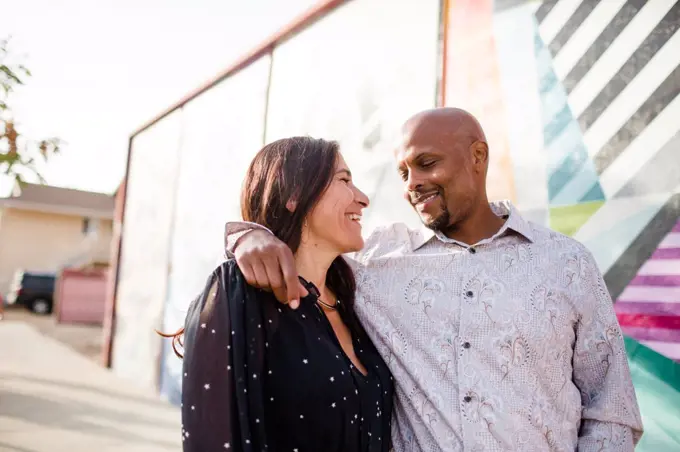 Late Forties Couple Standing in Front of Mural in San Diego