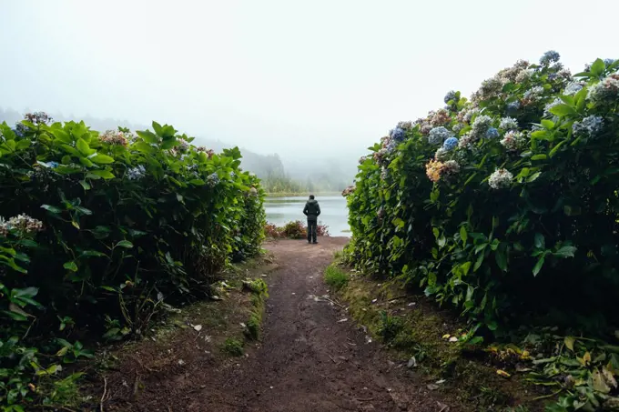 Silhouette of a tourist man enjoying views