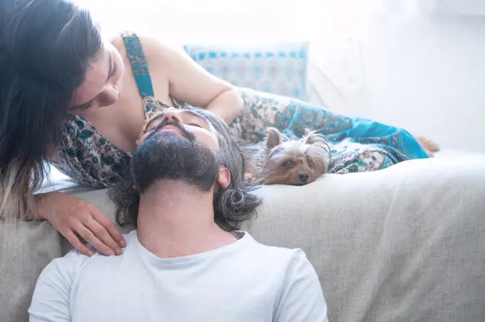 Couple in love laughing in their room. Valentine's day