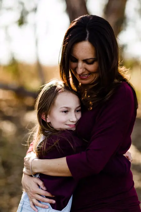 Mother Holding Daughter at Park in Chula Vista