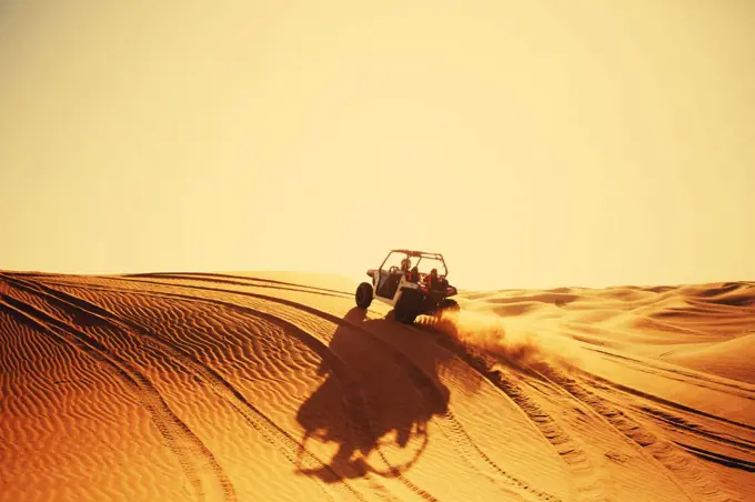 Buggy quad bike with smoke rides in Dubai desert dunes safari