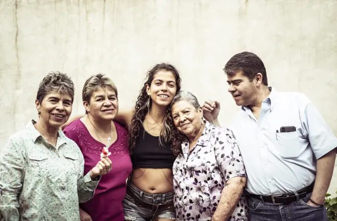 Generations of happy Mexican family in summer