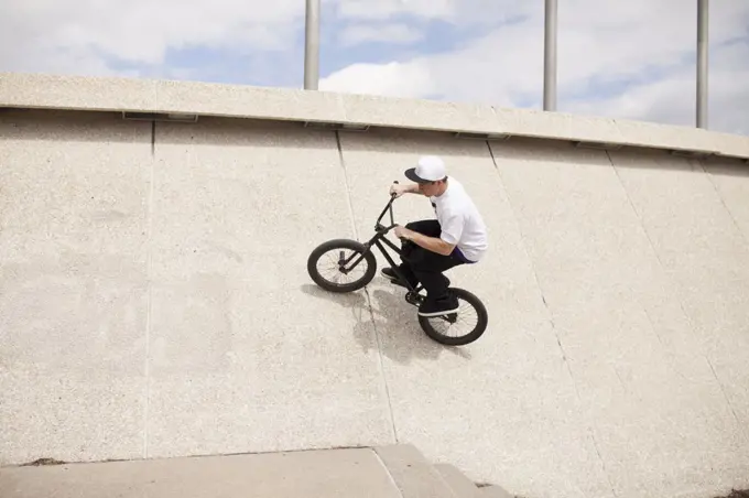 Young bmx rider trying to land trick