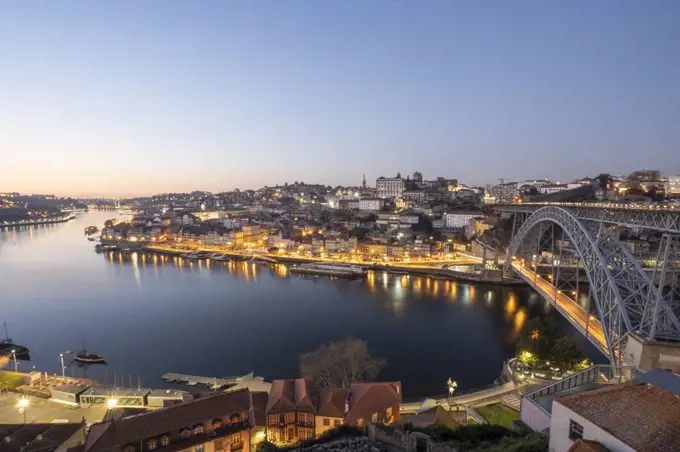 WS panorama of Oporto city, iconic bridge and Douro river at night