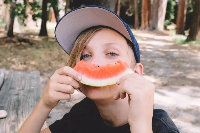 Boy Turns Watermelon Rind into a Smile.