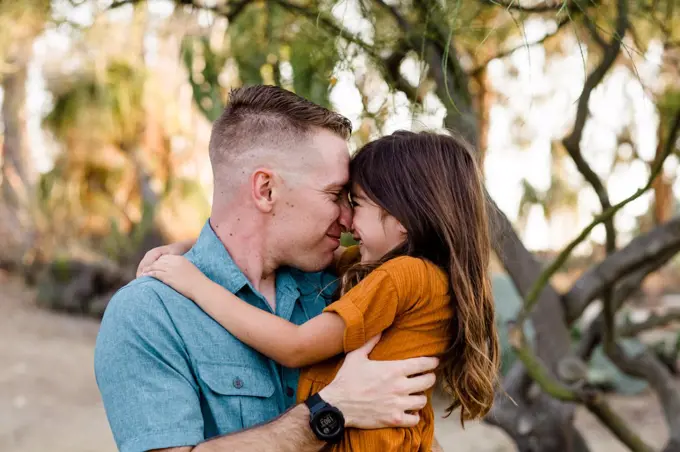 Dad & Daughter Embracing in Desert Garden in San Diego