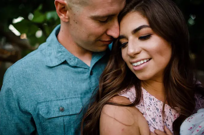 Close Up of Husband & Wife Embracing in San Diego