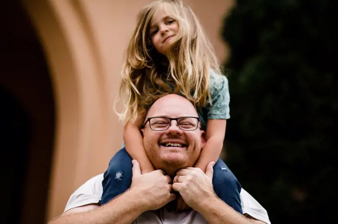 Smiling Dad with Four Year Old on Shoulders in San Diego